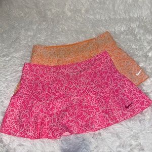 Two Pair Nike Dry-Fit tennis skorts Size Medium Pink and Creamsicle